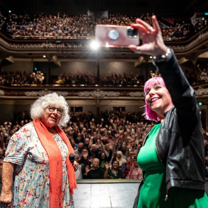 Miriam Margolyes and Peg Alexander take a selfie with the crowd at St George's Hall