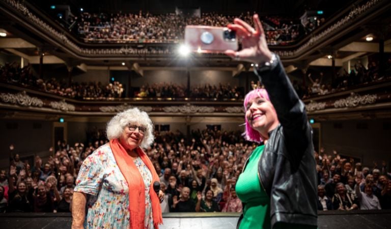 Miriam Margolyes and Peg Alexander take a selfie with the crowd at St George's Hall
